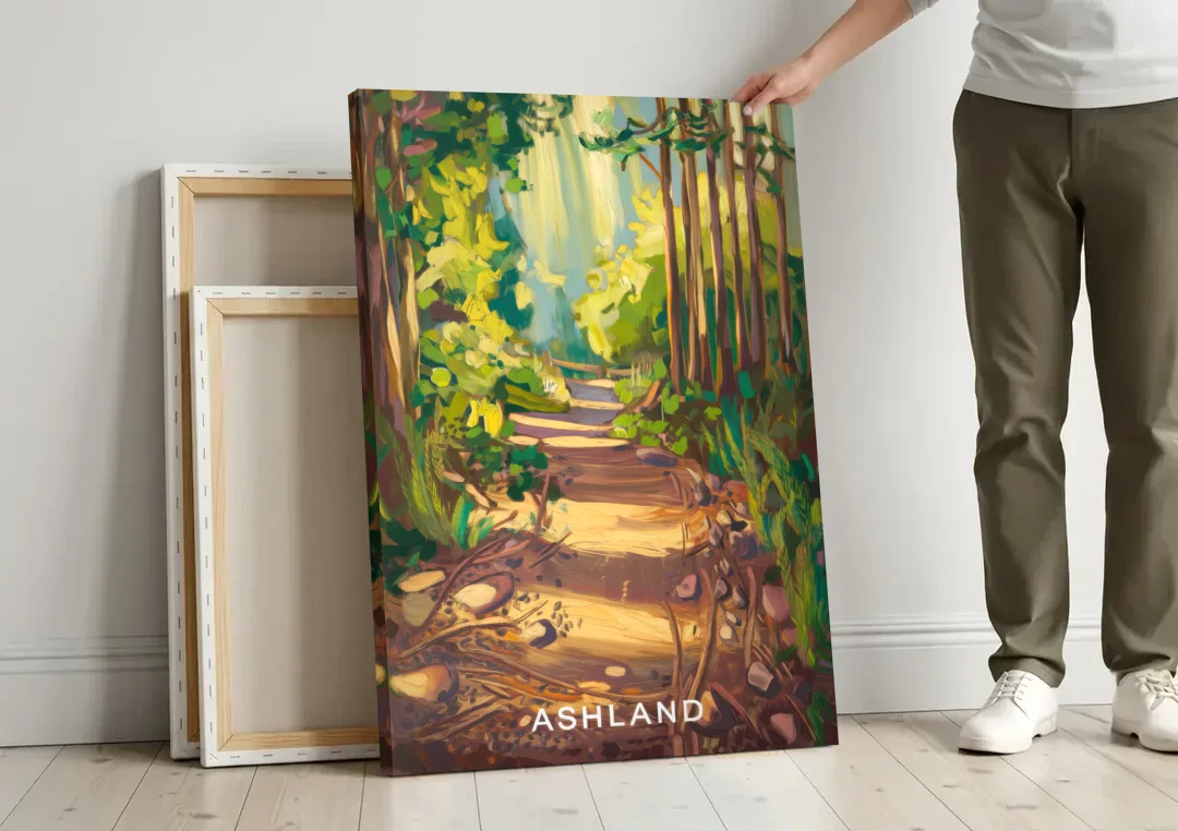 Ashland Hiking Paths canvas wall art leaning against a wall next to blank canvases