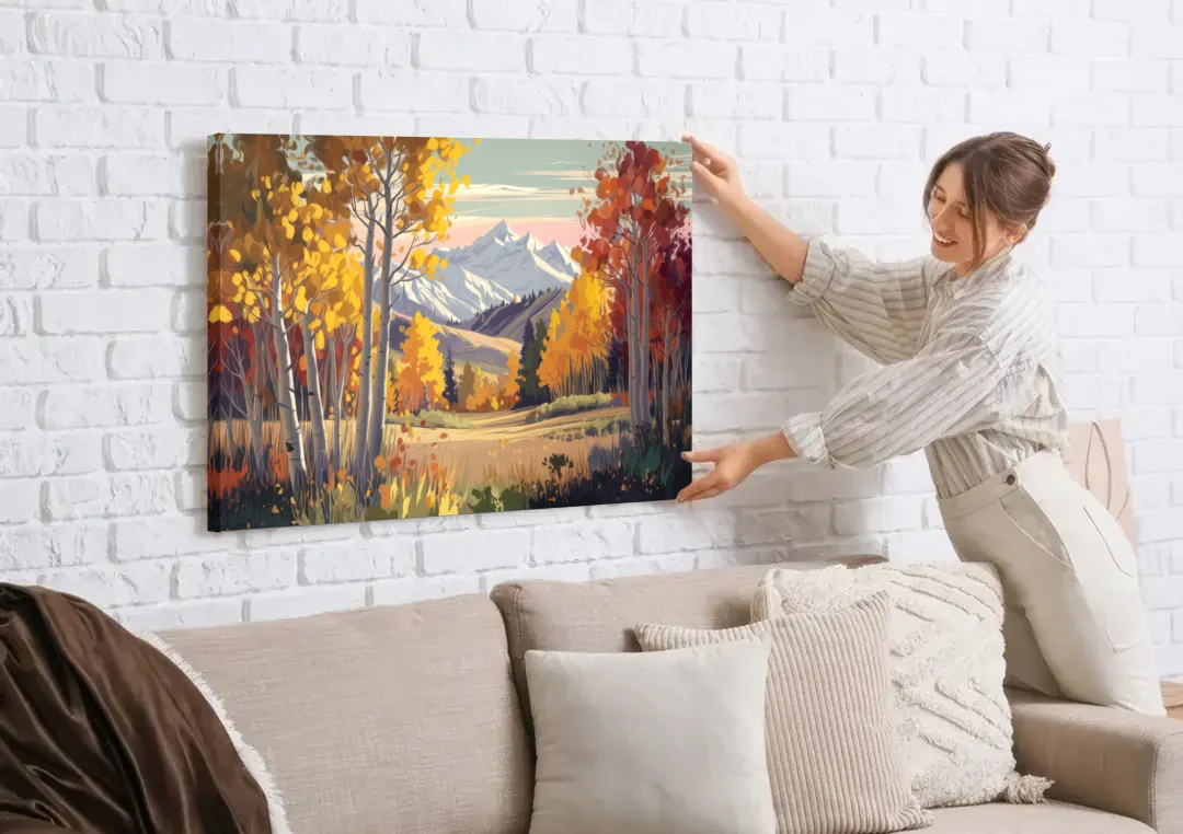 Aspen Majestic Landscape canvas wall art being hung on a white brick wall above a sofa