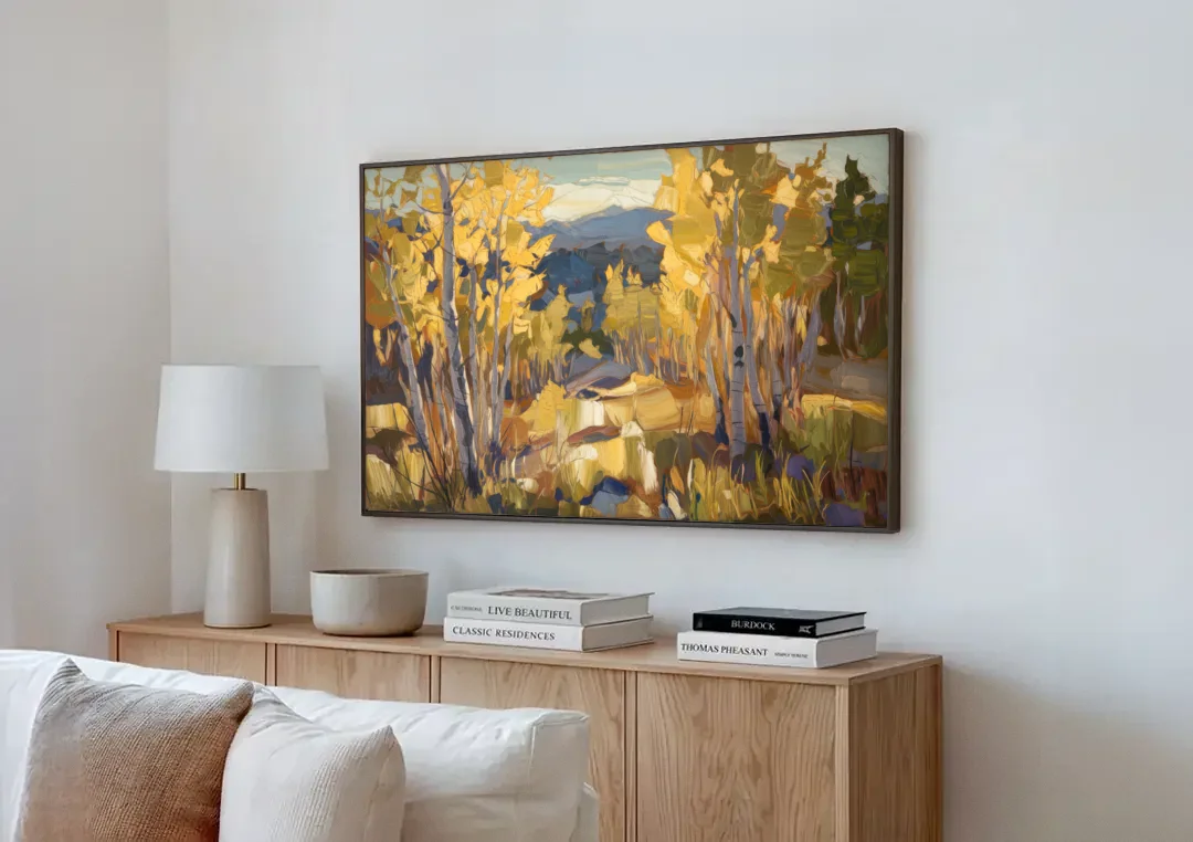 Aspen Wilderness Beauty canvas wall art above a wooden sideboard next to a sofa