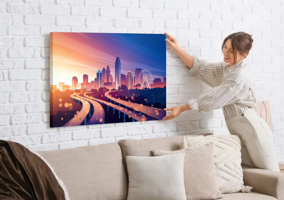 Atlanta Aerial City View canvas wall art being hung on a white brick wall above a sofa