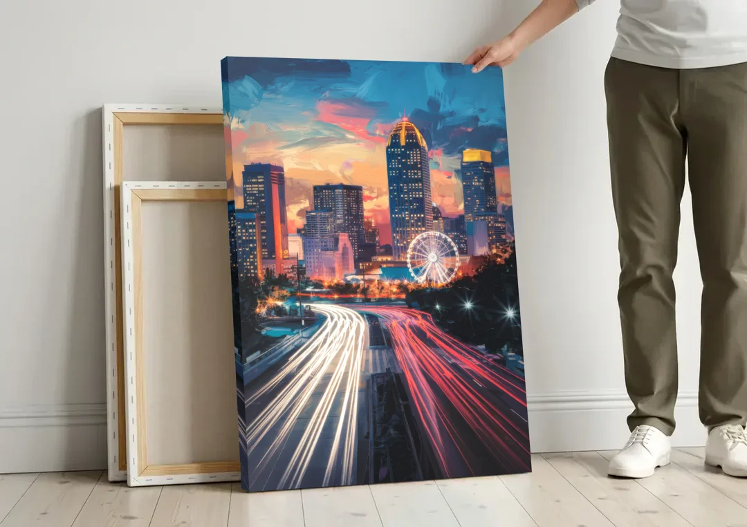 Atlanta Downtown Landmarks canvas wall art leaning against a wall next to blank canvases