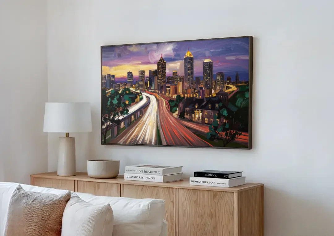 Atlanta Historic Neighborhoods canvas wall art above a wooden sideboard next to a sofa