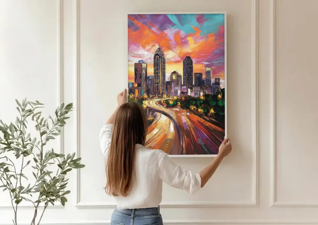 Atlanta Skyline at Sunset canvas wall art being hung on a paneled wall