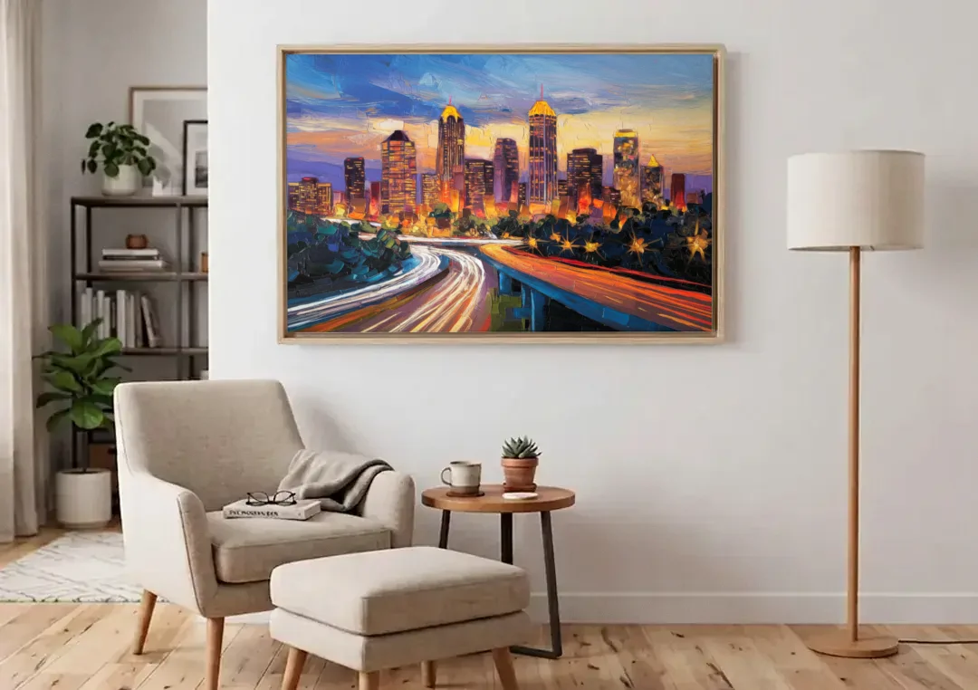 Atlanta Vibrant Downtown Scene canvas wall art above an armchair in a bright living room
