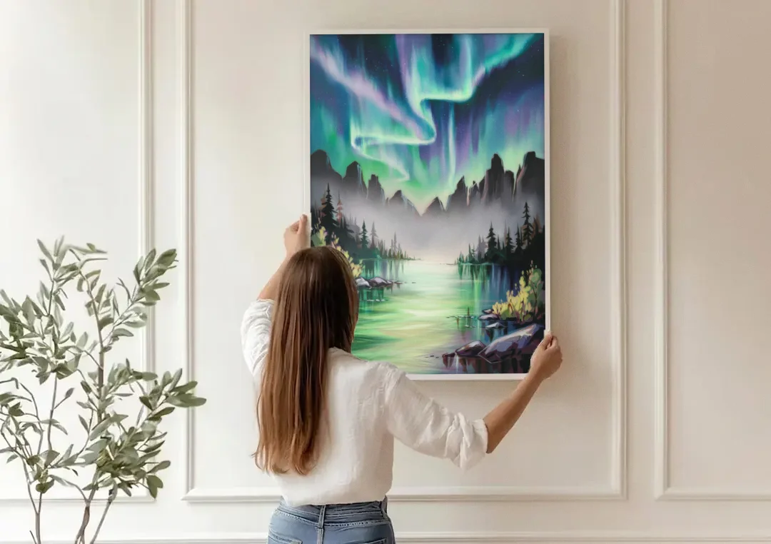 Aurora Borealis Landscape canvas wall art being hung on a paneled wall