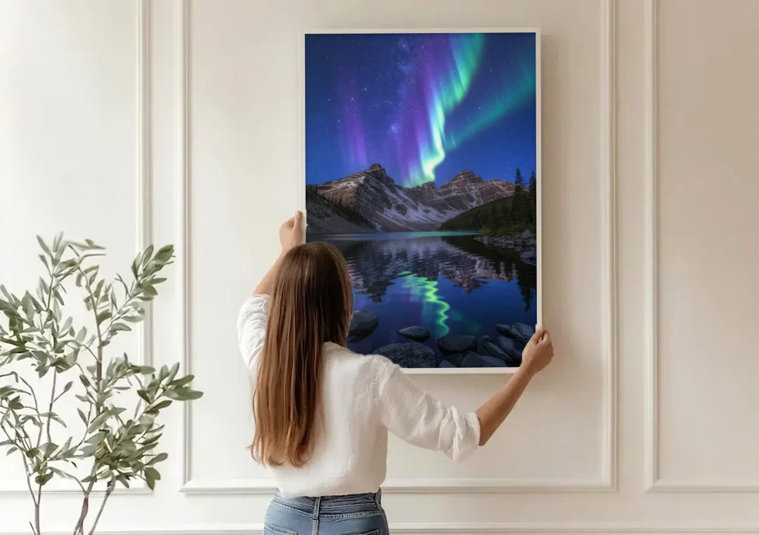 Aurora Mountain Reflection canvas wall art being hung on a paneled wall