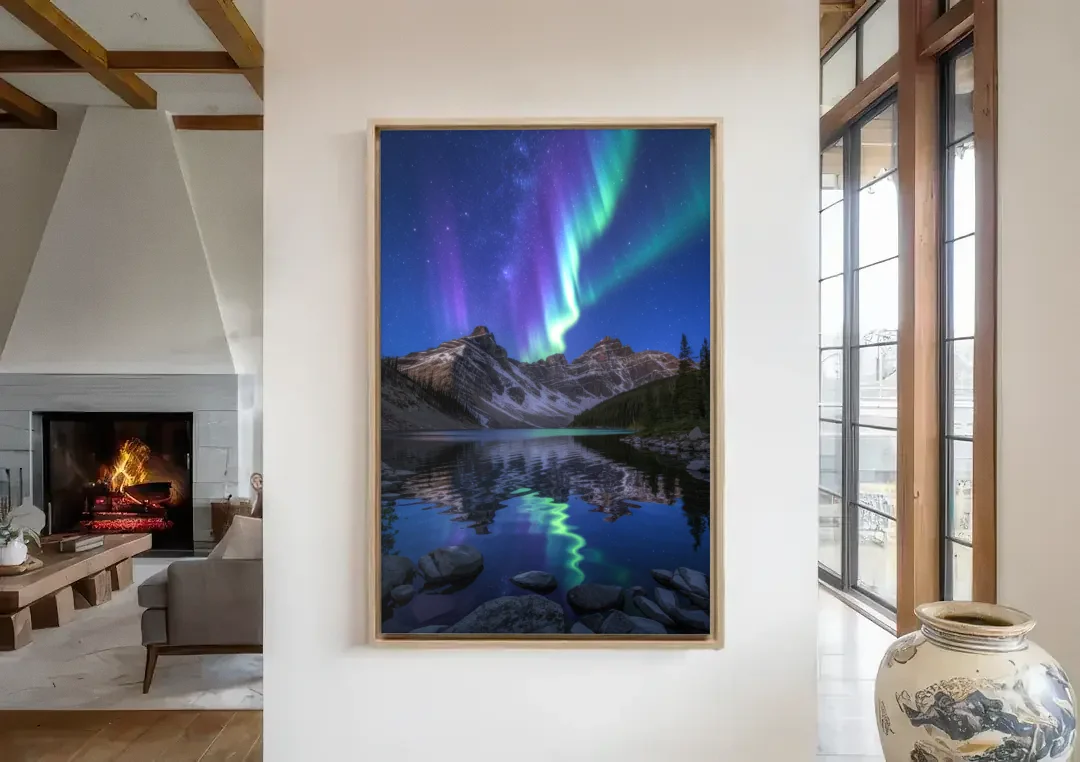 Aurora Mountain Reflection canvas wall art in a living room with a fireplace