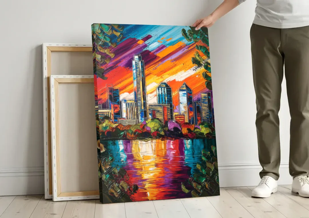 Austin Downtown Vibes canvas wall art leaning against a wall next to blank canvases