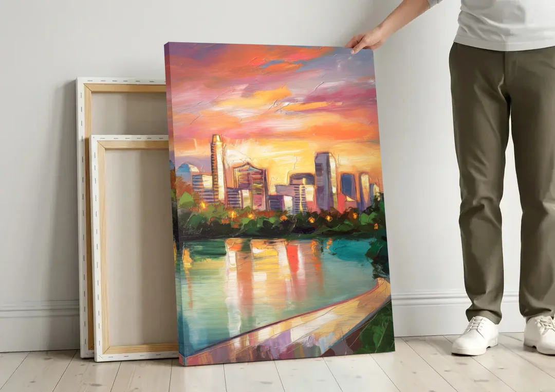 Austin Enchanting Cityscape canvas wall art leaning against a wall next to blank canvases