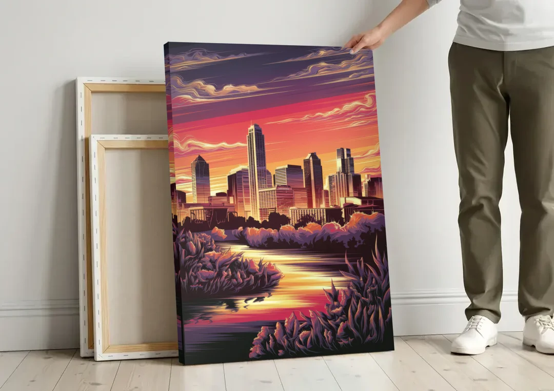 Austin Skyline Sunset canvas wall art leaning against a wall next to blank canvases