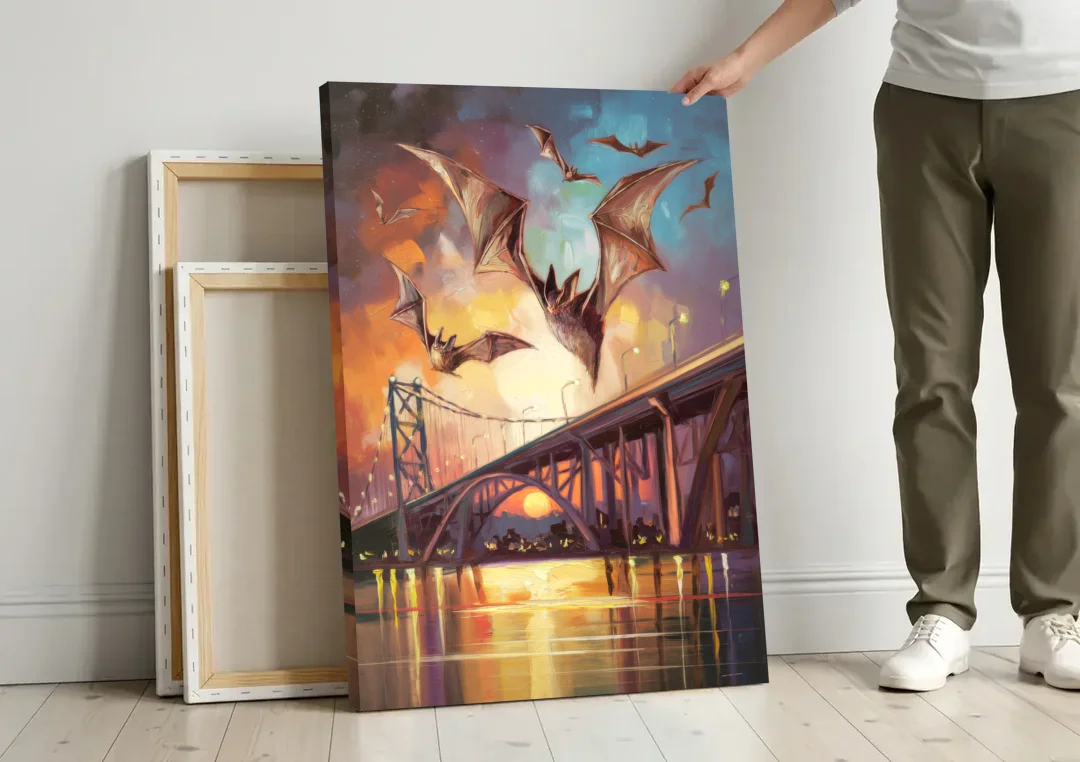 Austin Soaring Bats Scene canvas wall art leaning against a wall next to blank canvases