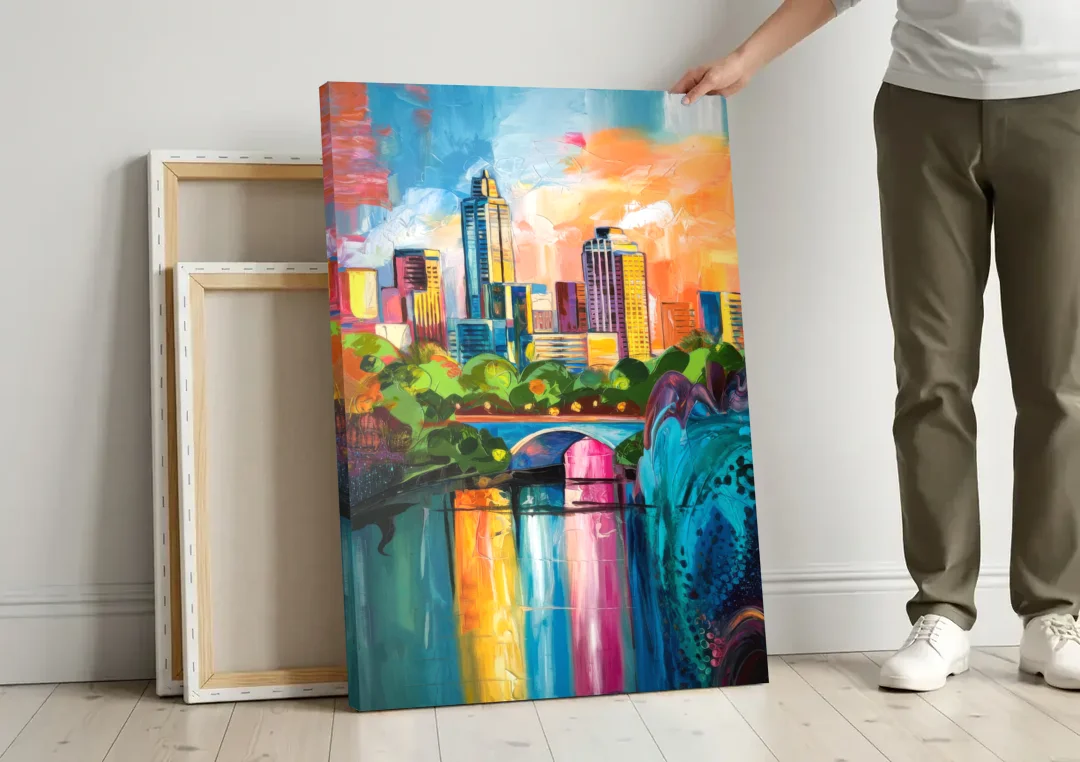Austin Street Art Culture canvas wall art leaning against a wall next to blank canvases