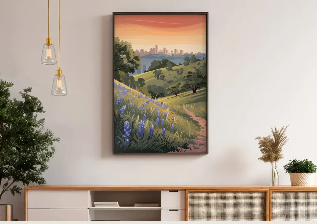 Austin Texas Hill Country canvas wall art above a wooden sideboard under pendant lights