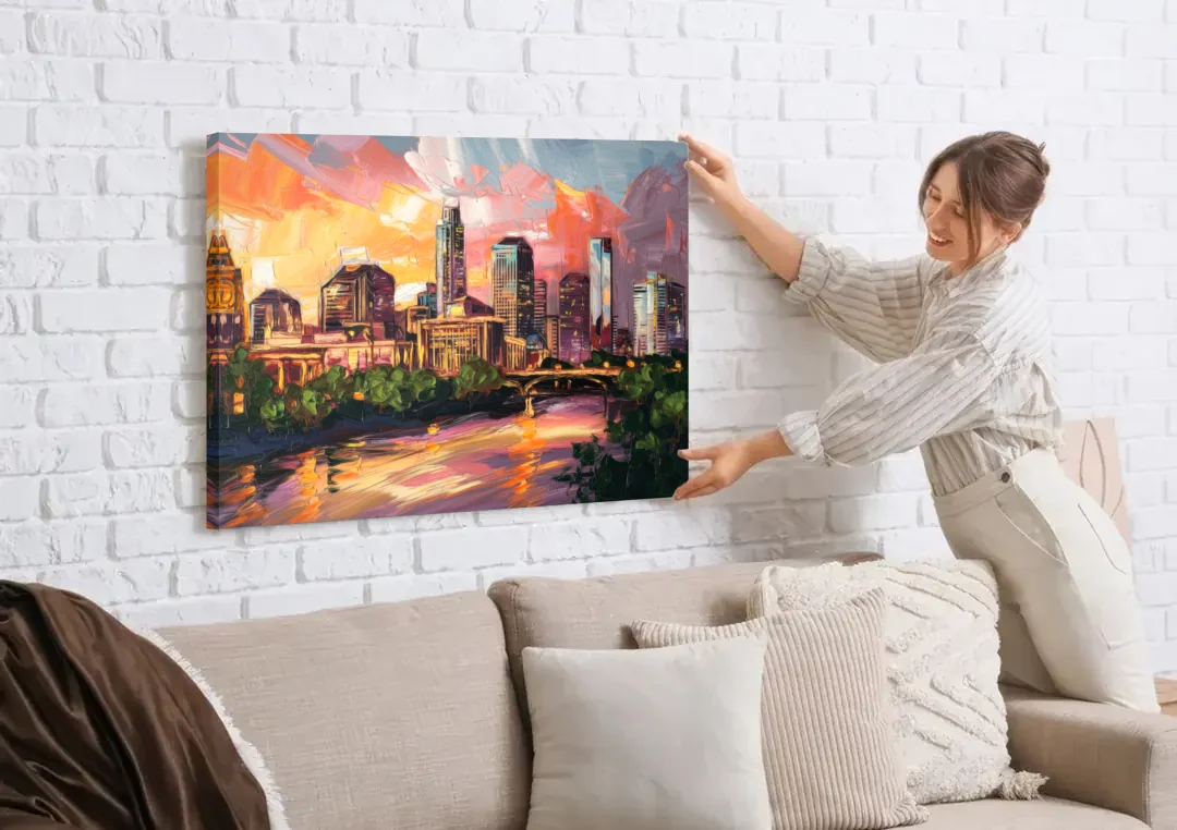 Austin Urban Charm canvas wall art being hung on a white brick wall above a sofa