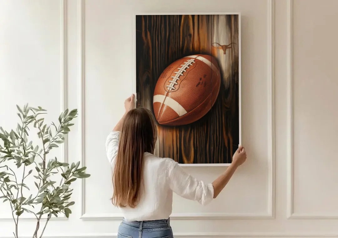 Austin UT Football Energy canvas wall art being hung on a paneled wall