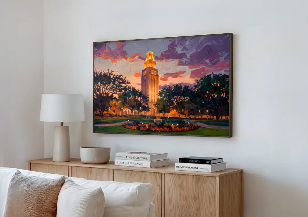 Austin Ut Tower Glow canvas wall art above a wooden sideboard next to a sofa