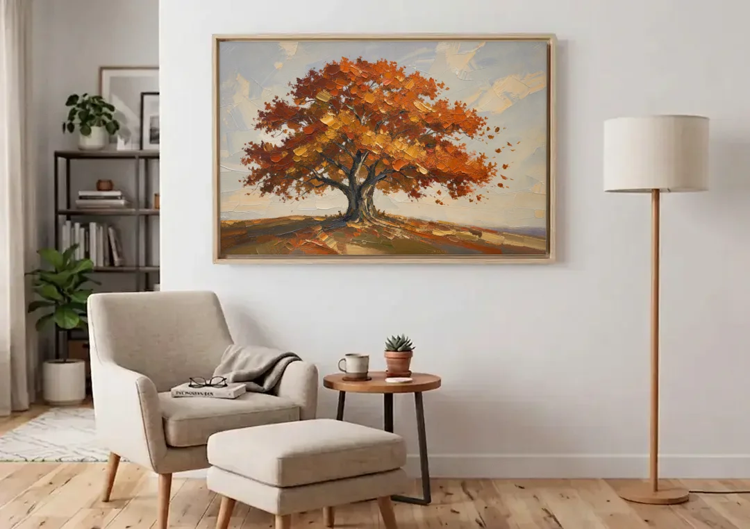 Autumn Tree Painting with Windblown Oak Leaves canvas wall art above an armchair in a bright living room