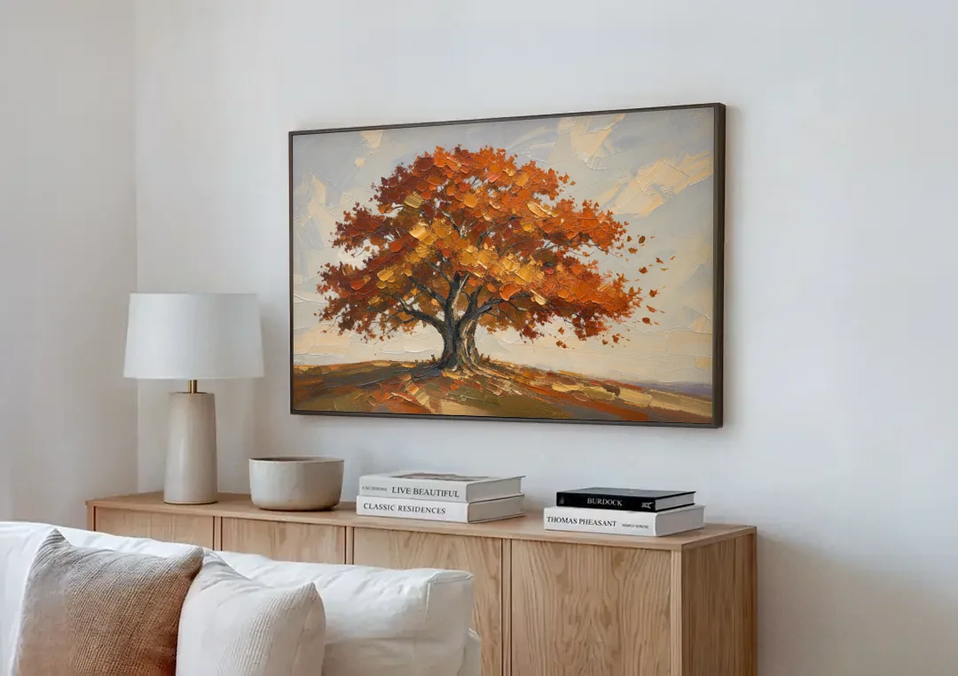 Autumn Tree Painting with Windblown Oak Leaves canvas wall art above a wooden sideboard next to a sofa
