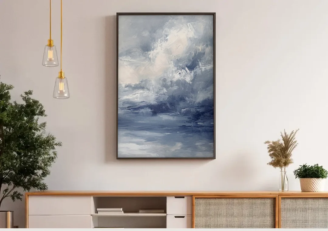 Azure Veil II canvas wall art above a wooden sideboard under pendant lights