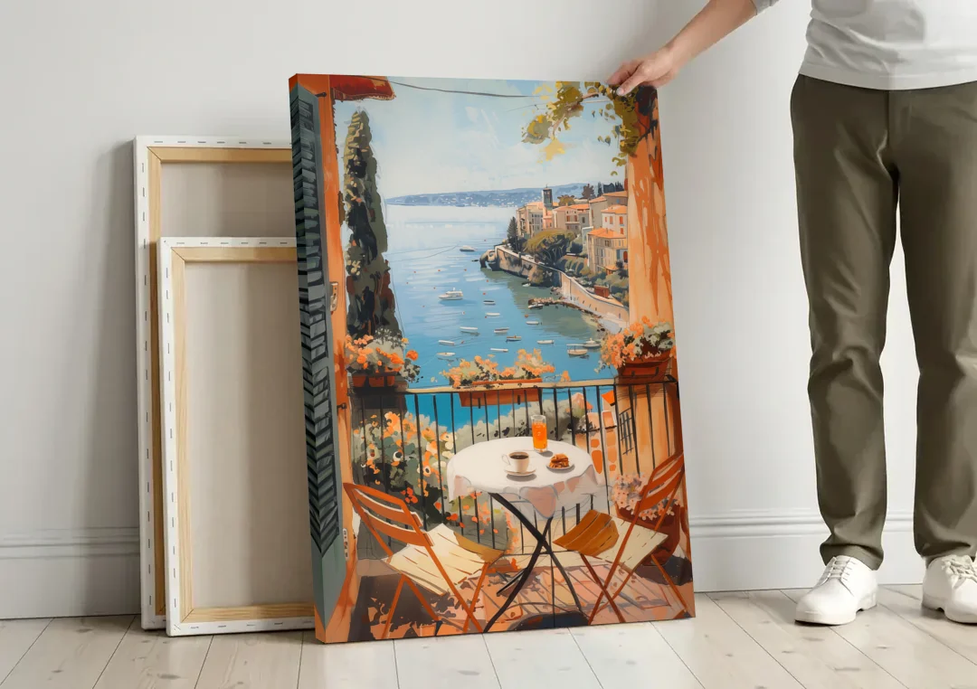 Balcony Painting Over an Italian Bay canvas wall art leaning against a wall next to blank canvases