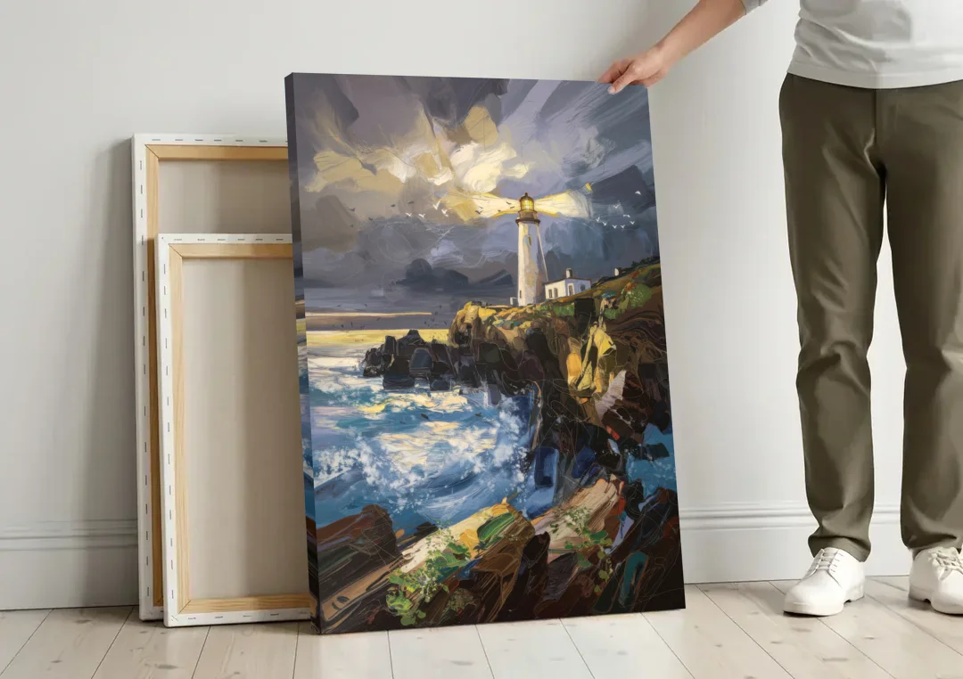Bandon Lighthouse View canvas wall art leaning against a wall next to blank canvases