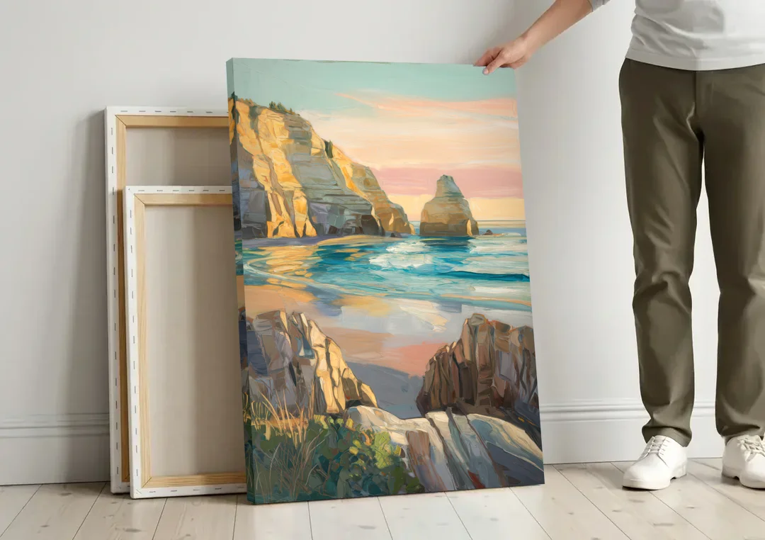 Bandon Ocean Cliffs canvas wall art leaning against a wall next to blank canvases