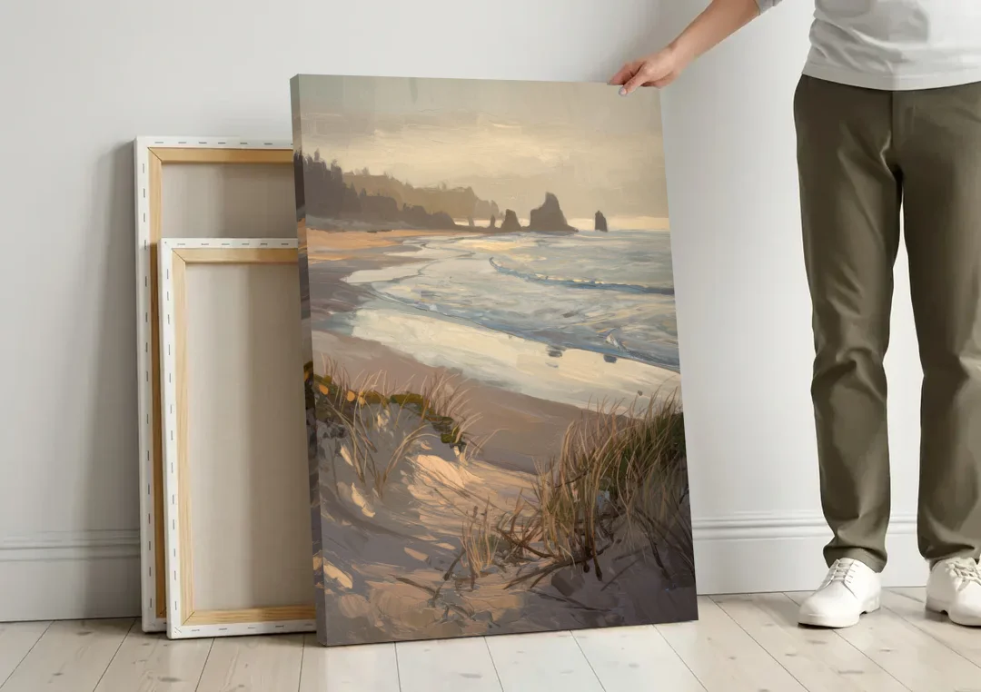 Bandon Pacific Coast canvas wall art leaning against a wall next to blank canvases
