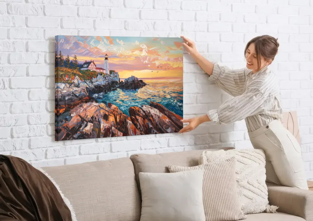 Bar Harbor Lighthouse Landscape canvas wall art being hung on a white brick wall above a sofa