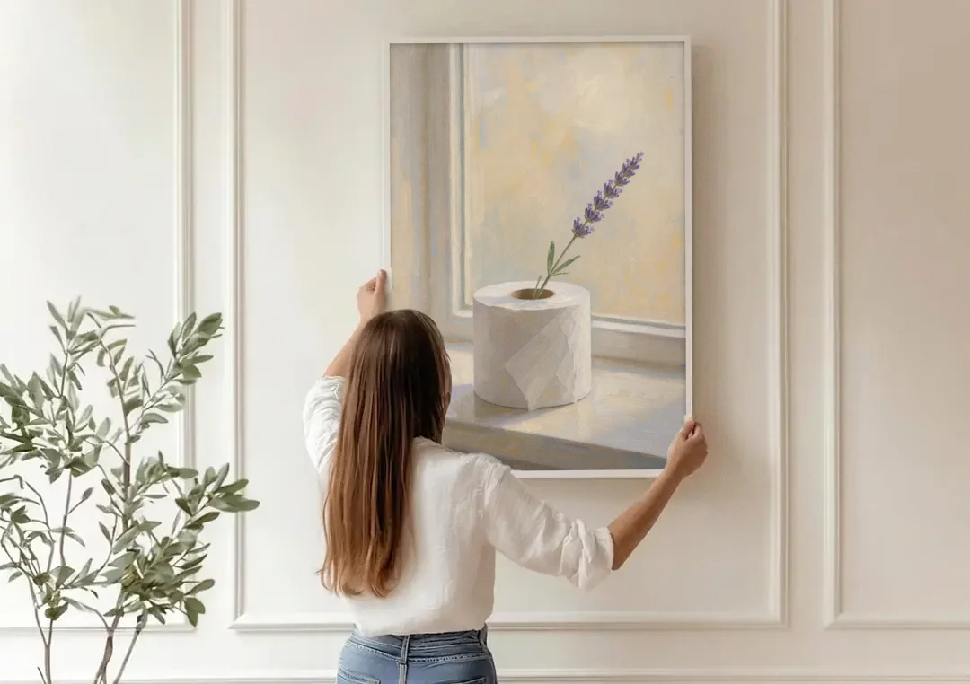 Bathroom Decor Wall Art with a Lavender Sprig canvas wall art being hung on a paneled wall