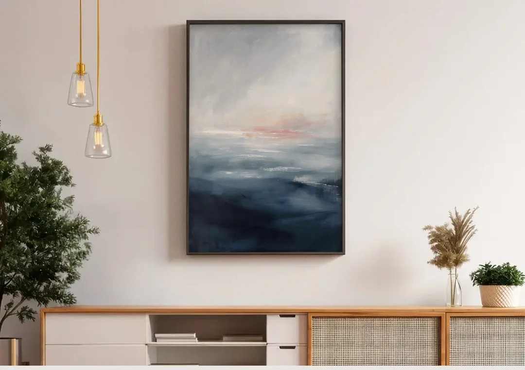 Bathroom Paintings Blush Dawn Over a Misty Sea canvas wall art above a wooden sideboard under pendant lights
