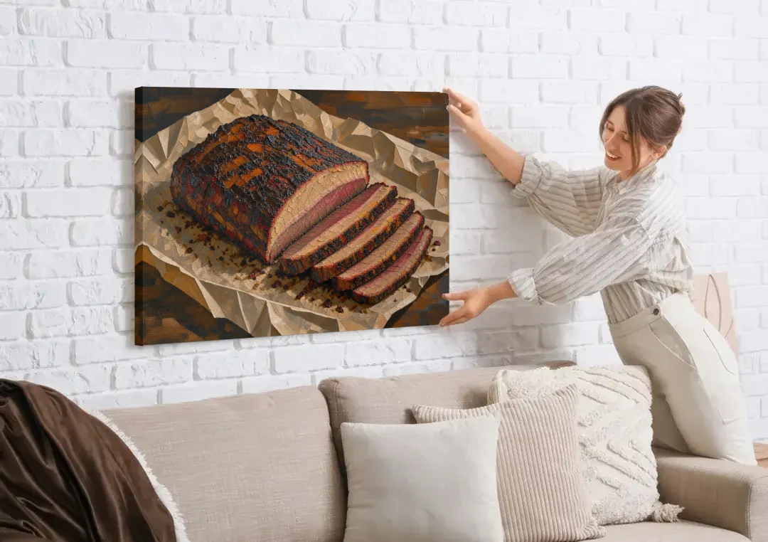 BBQ Art Smoked Brisket on Butcher Paper canvas wall art being hung on a white brick wall above a sofa