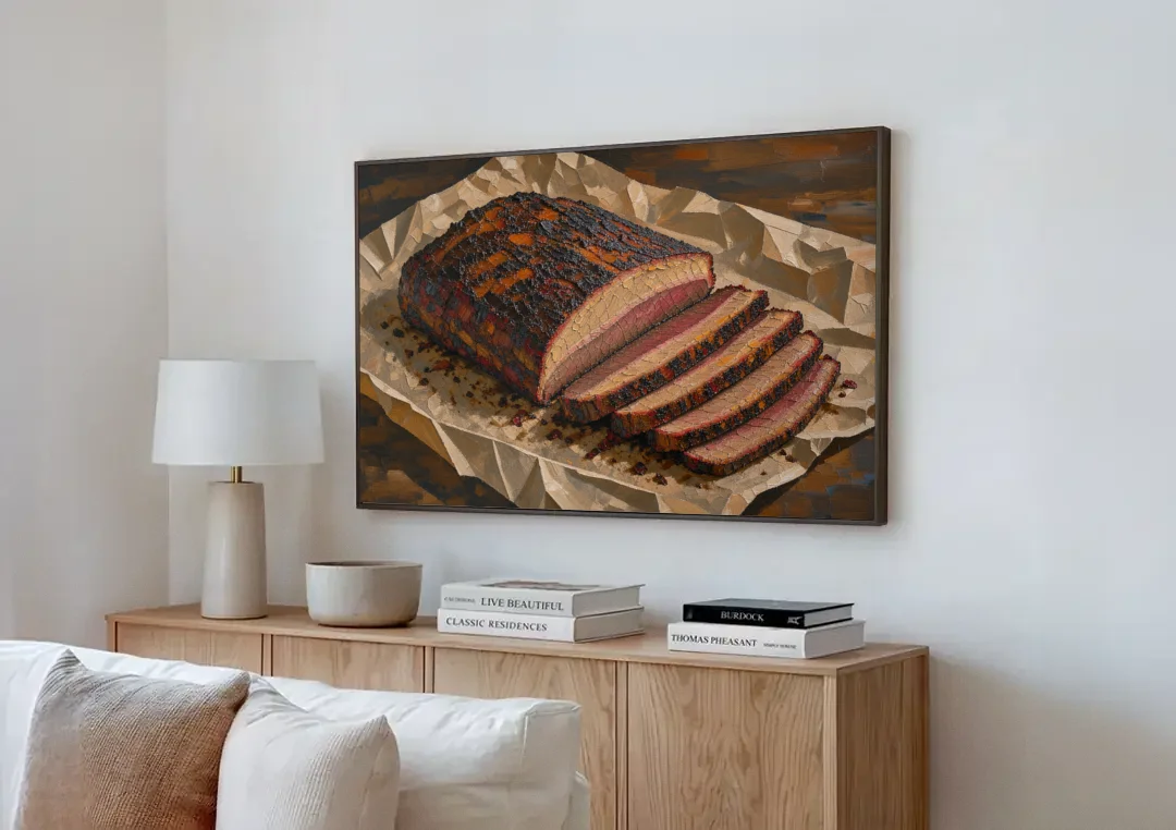 BBQ Art Smoked Brisket on Butcher Paper canvas wall art above a wooden sideboard next to a sofa