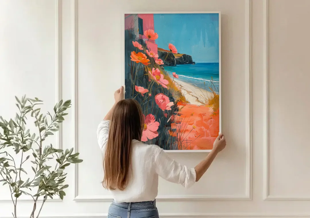 Beach Painting with Pink Cosmos Flowers canvas wall art being hung on a paneled wall