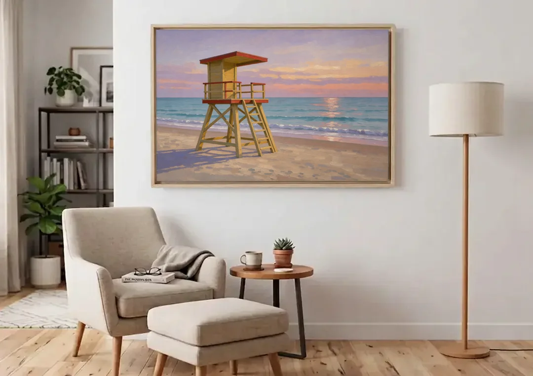 Beach Wall Art for Living Room with Lifeguard Stand canvas wall art above an armchair in a bright living room