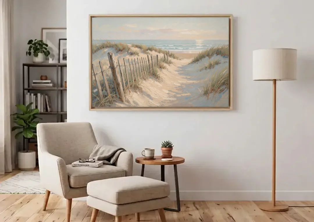 Beachy Wall Decor with a Weathered Dune Fence canvas wall art above an armchair in a bright living room