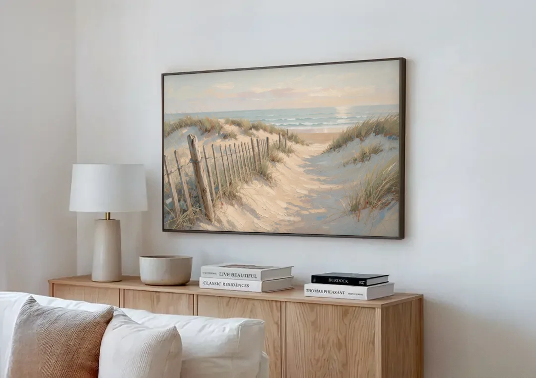 Beachy Wall Decor with a Weathered Dune Fence canvas wall art above a wooden sideboard next to a sofa