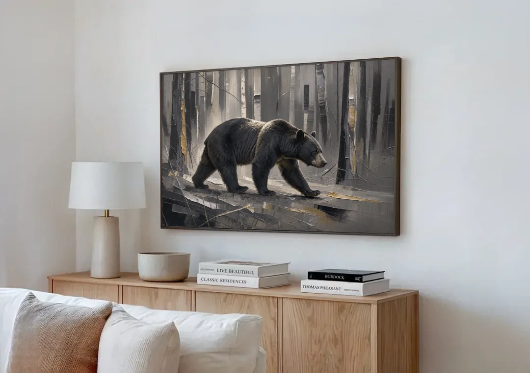 Bear Walking Through the Silver Woods canvas wall art above a wooden sideboard next to a sofa