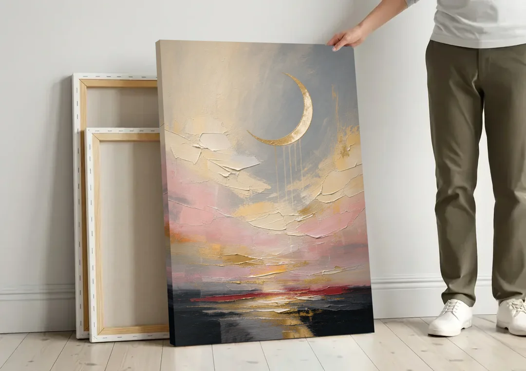 Bedroom Wall Art Neutral Crescent Moon at Dusk canvas wall art leaning against a wall next to blank canvases