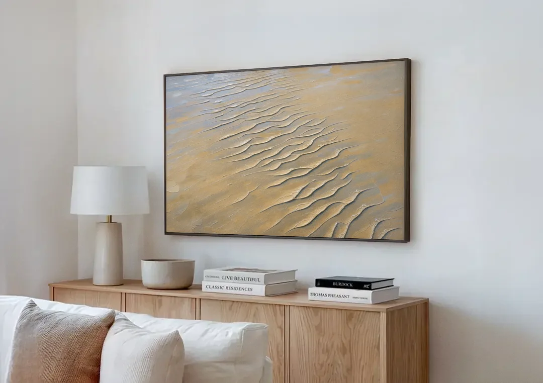 Beige Textured Wall Art of Rippled Tidal Sand canvas wall art above a wooden sideboard next to a sofa