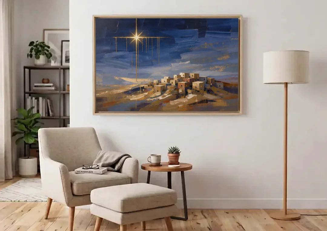 Bethlehem Painting with Sleeping Hilltop Town canvas wall art above an armchair in a bright living room
