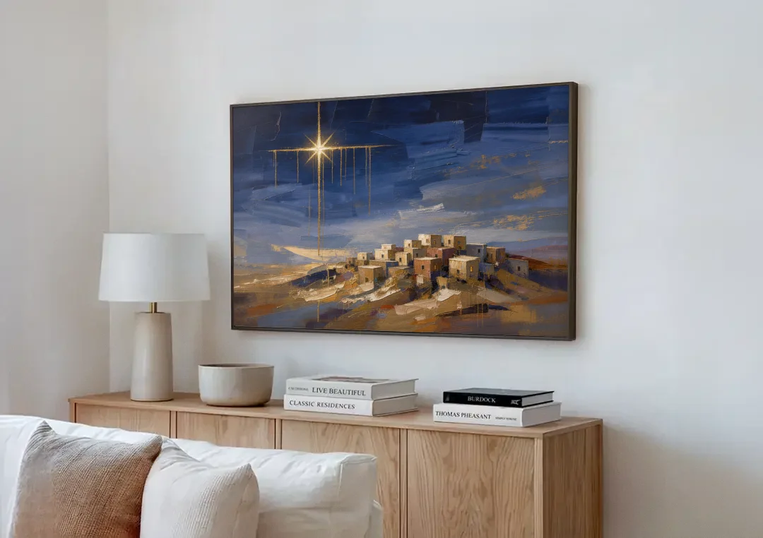 Bethlehem Painting with Sleeping Hilltop Town canvas wall art above a wooden sideboard next to a sofa