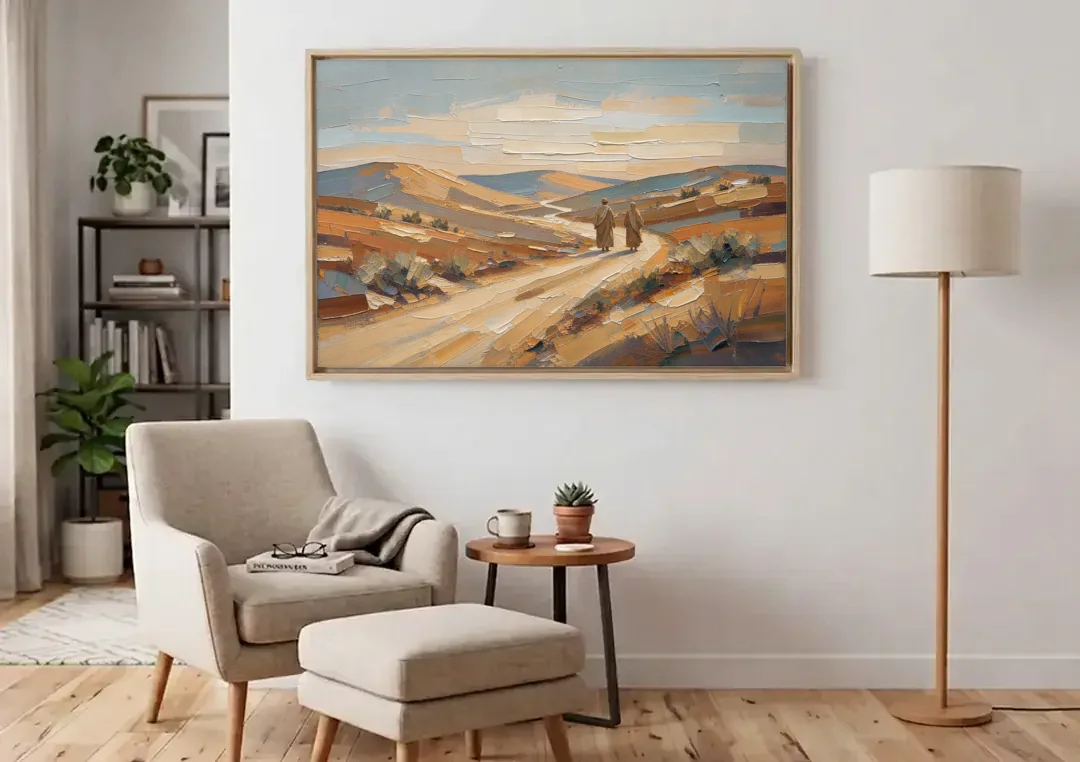 Biblical Wall Art of Two Walking the Judean Road canvas wall art above an armchair in a bright living room