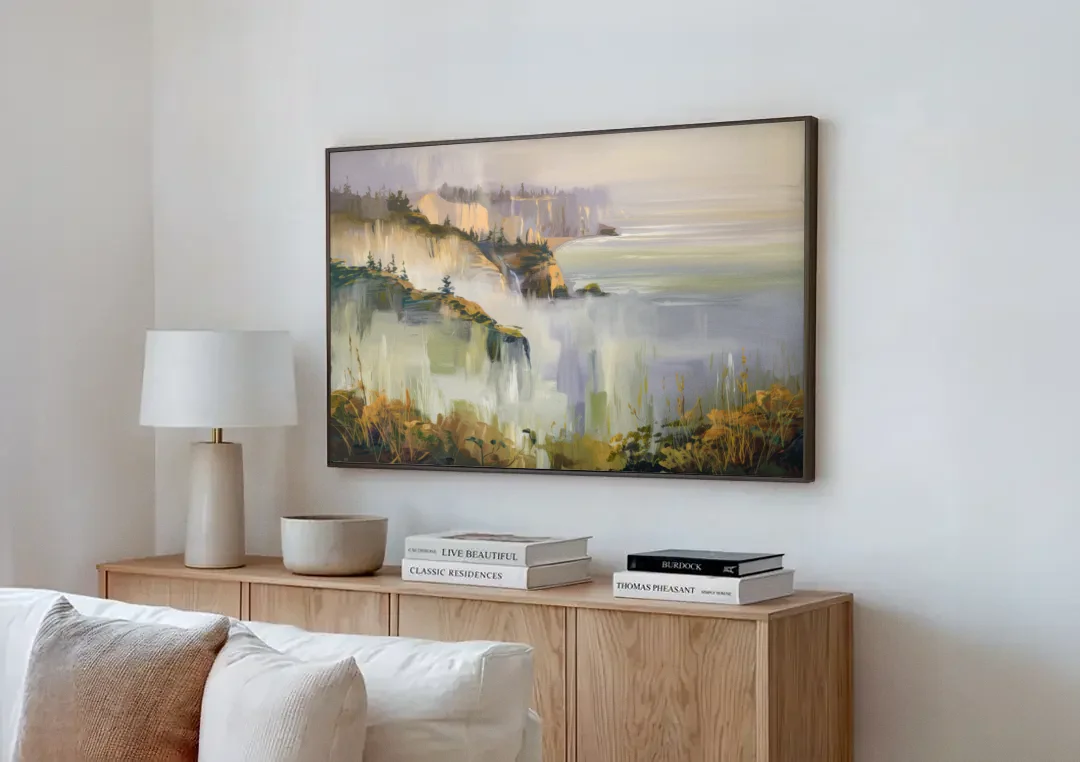 Big Sur Morning Fog canvas wall art above a wooden sideboard next to a sofa