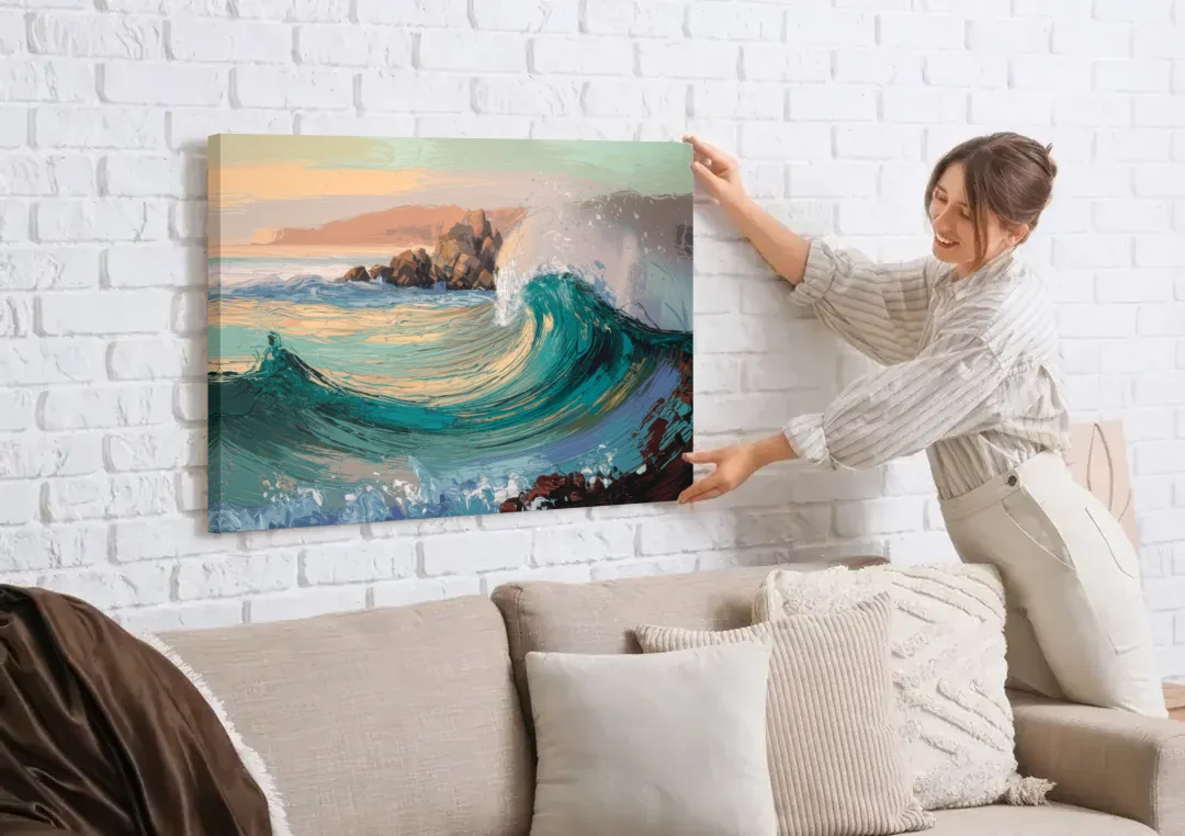 Big Sur Pacific Waves canvas wall art being hung on a white brick wall above a sofa