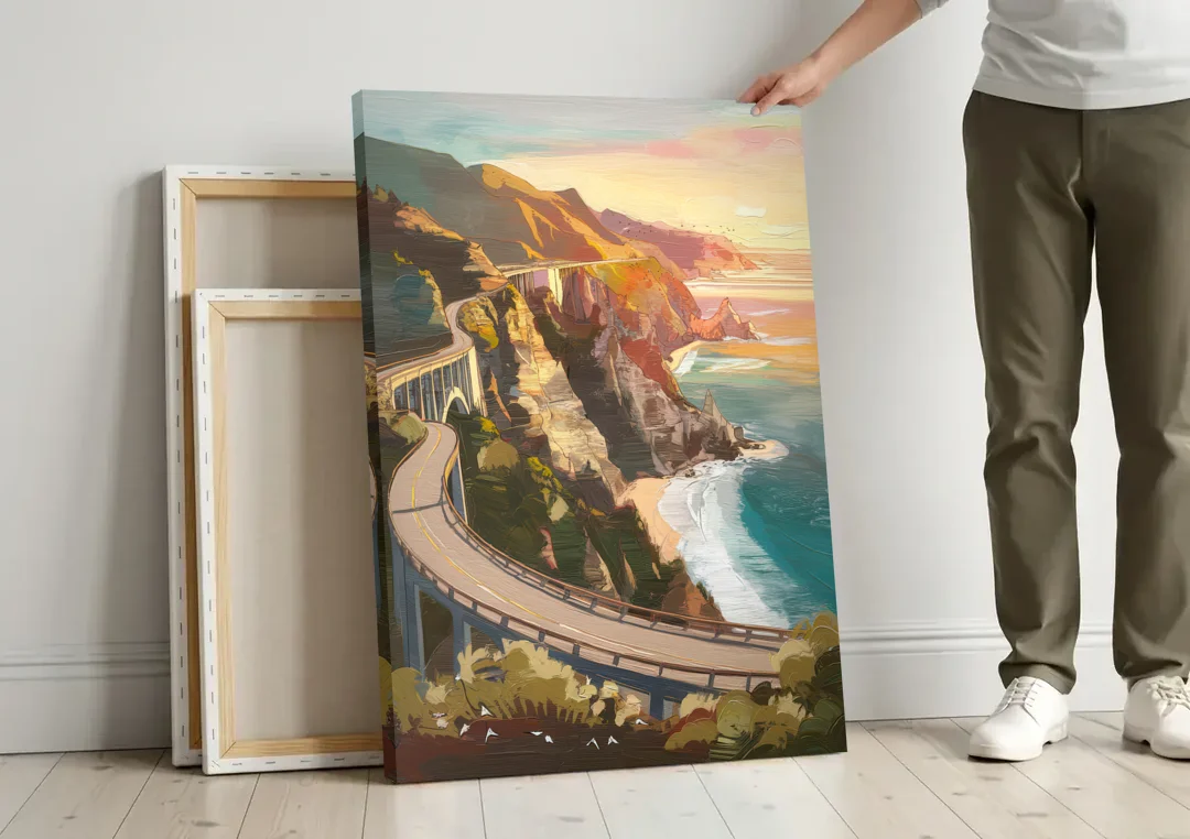 Big Sur Scenic Highway canvas wall art leaning against a wall next to blank canvases