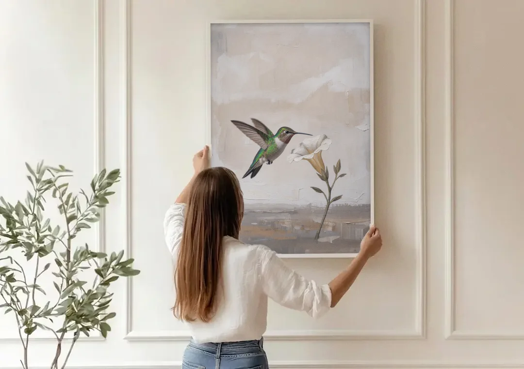 Bird Painting Canvas Hummingbird at the Pale Bloom canvas wall art being hung on a paneled wall