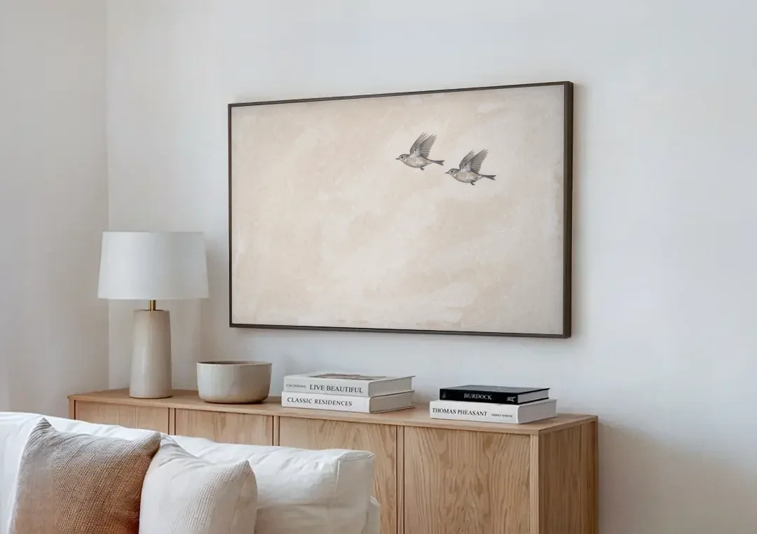 Bird Wall Art of a Pair in Beige Air canvas wall art above a wooden sideboard next to a sofa