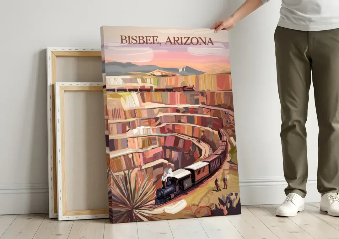 Bisbee Copper Mining Heritage canvas wall art leaning against a wall next to blank canvases