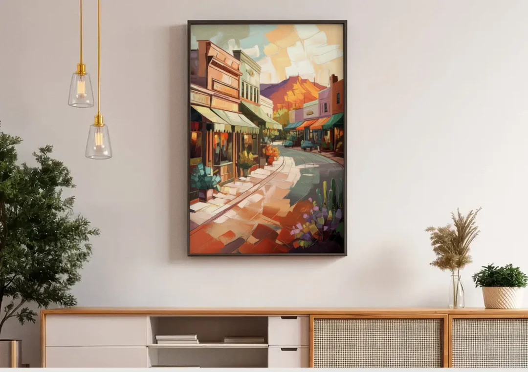 Bisbee Historic Streetscape canvas wall art above a wooden sideboard under pendant lights
