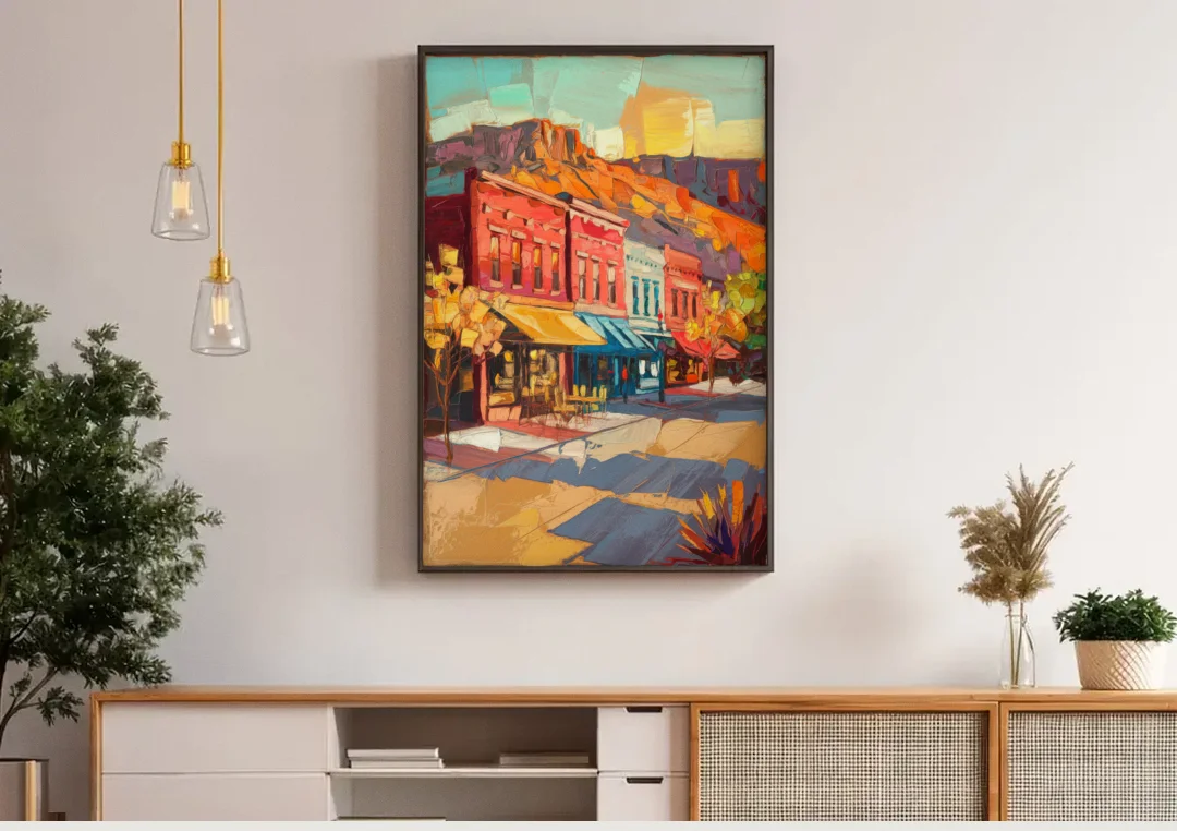 Bisbee Quaint Downtown View canvas wall art above a wooden sideboard under pendant lights